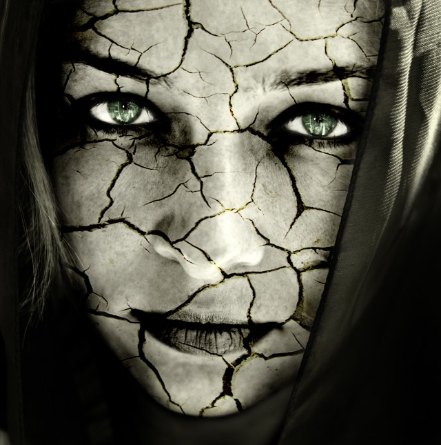 Face Of Woman With Cracked Skin